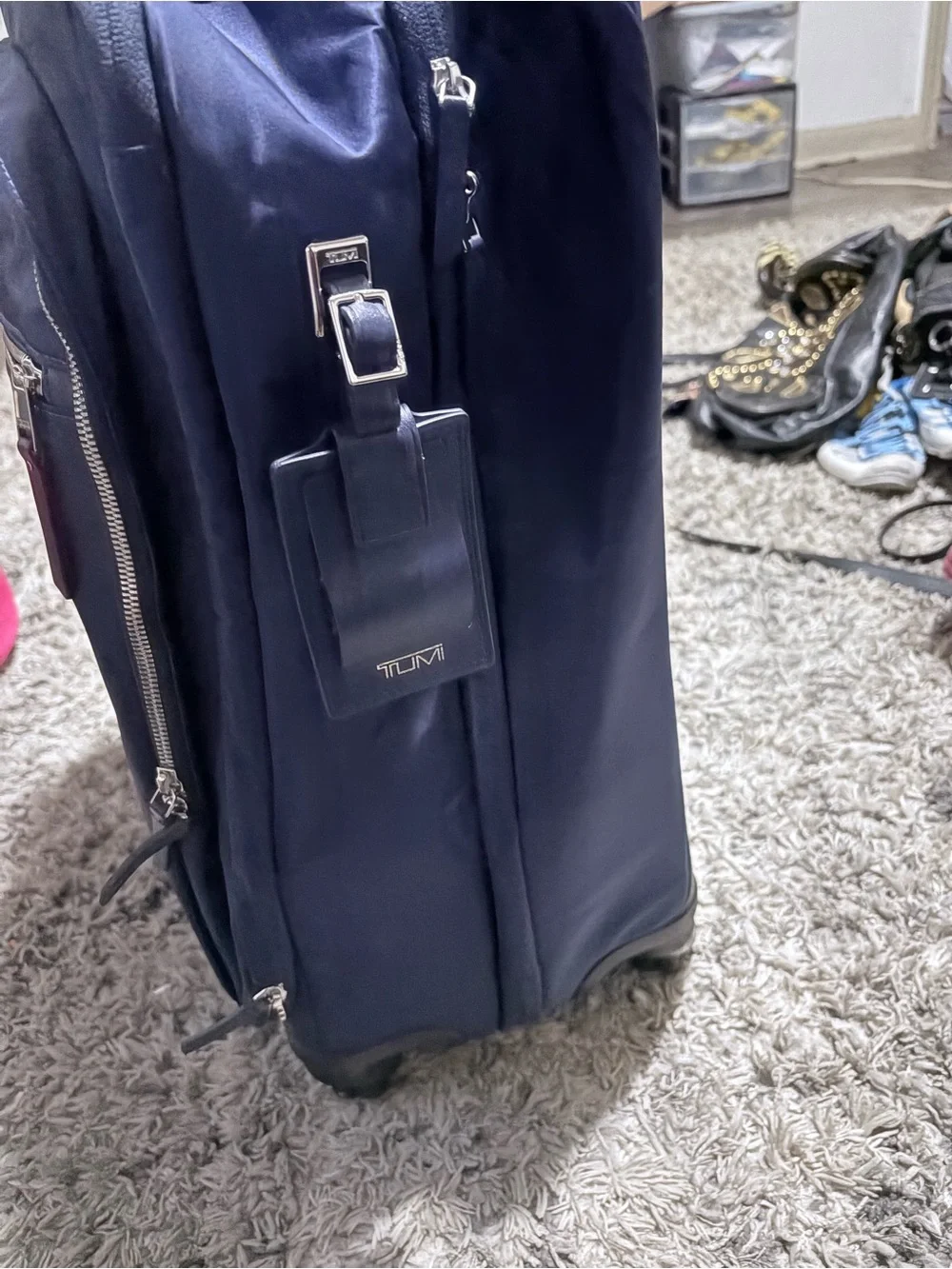 Tumi Carry-On Spinner rolling luggage